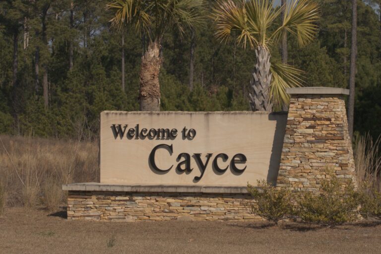 welcome sign to Cayce