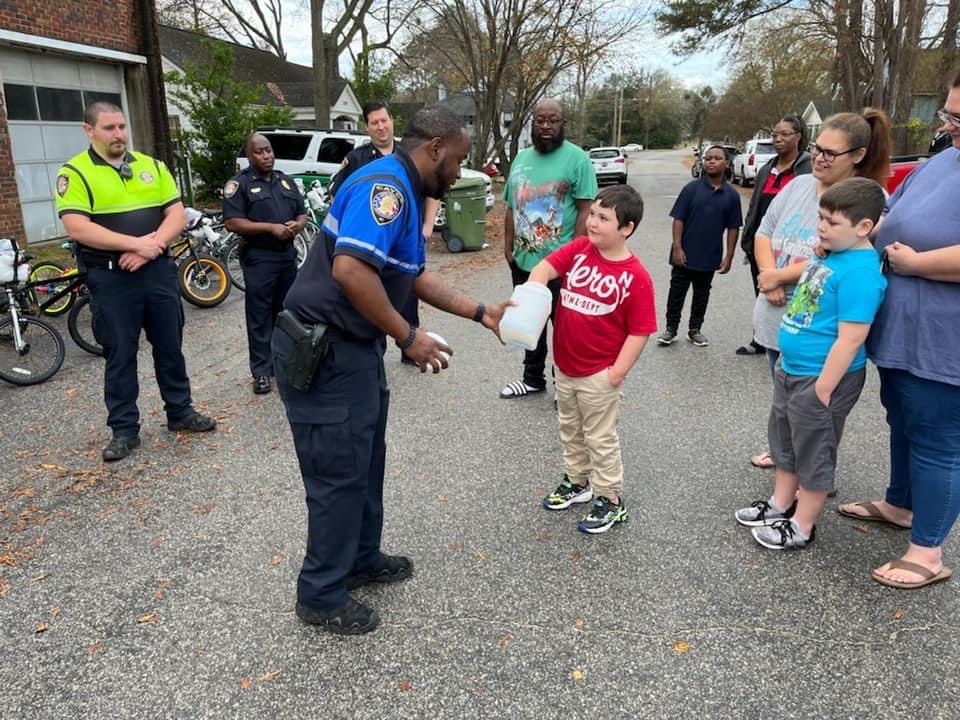 police officers helping the community