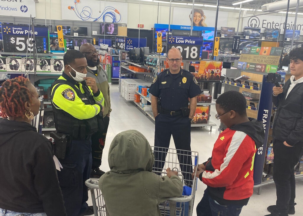 Chief Cowan with participants of shop with a cop 2021