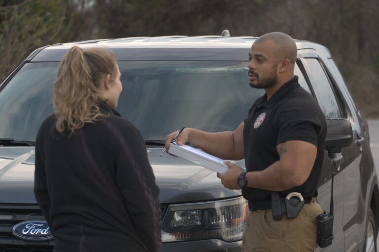 Investigator D Stewart interviewing a unknown female