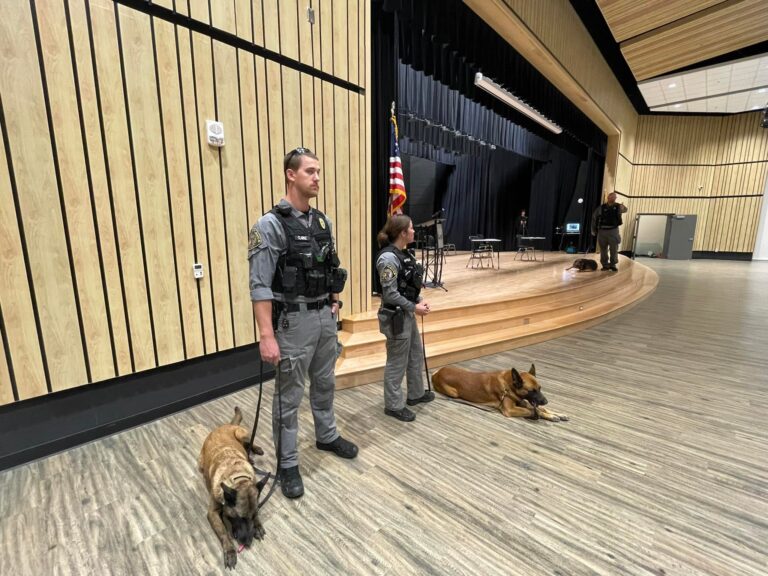 K9 Officers Clarke with K9 Kimber and Sperbeck with K9 Rocco