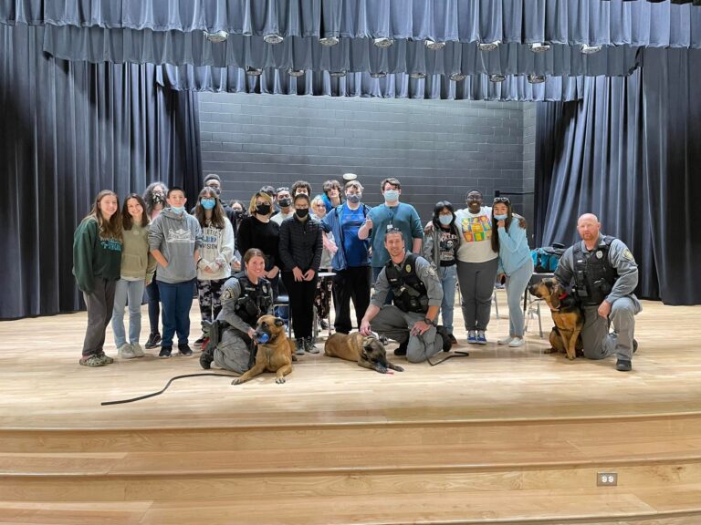 K9 Officers Clarke with K9 Kimber and Sperbeck with K9 Rocco and Officer Poole with K9 Bella along with Students of the Lex 2 Innovation Center