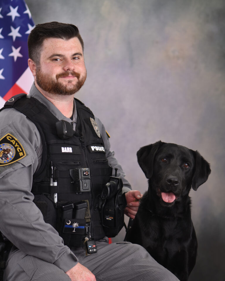 headshot of K9 officer Barr and K9 Molly